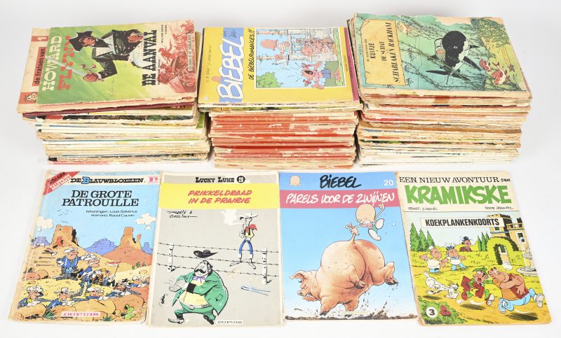 Een lot van ongeveer 100 strips in zeer gelezen toestand. Suske & Wiske, De Blauwbloezen, Kuifje, Nero en vele anderen.