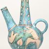 Een vintage lava-glaze vaas, met de afbeeldingen van Pan en Bachus. Getekend; Italy, 437.