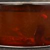 Een zilveren armband bezet met amber. Gemerkt 835‰.