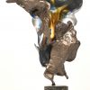 ‘Vrouwelijk torso’, een beeld van brons en meerkleurig glas. Getekend; Lohé. Met certificaat.