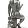 ‘Knielend naakt met boek’, een gepatinneerd bronzen beeldje. Getekend; A. Puttemans.
