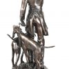 ‘Hoornblazer met jachthonden’, een gepatinneerd kunstbronzen beeld op zwarte marmeren voet. Naar A. Moreau.