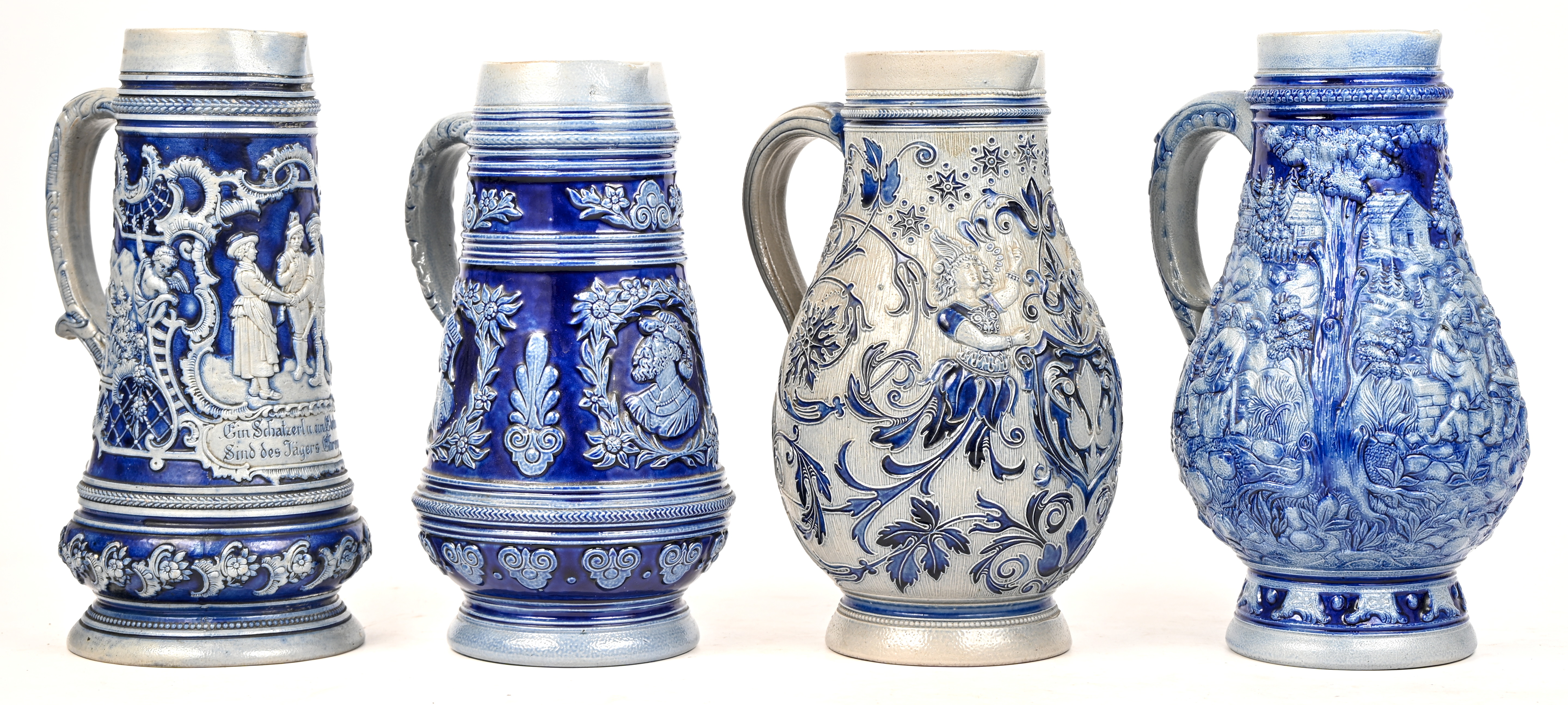 Acht schenkkannen van Westerwald aardewerk Acht schenkkannen van Westerwald aardewerk.