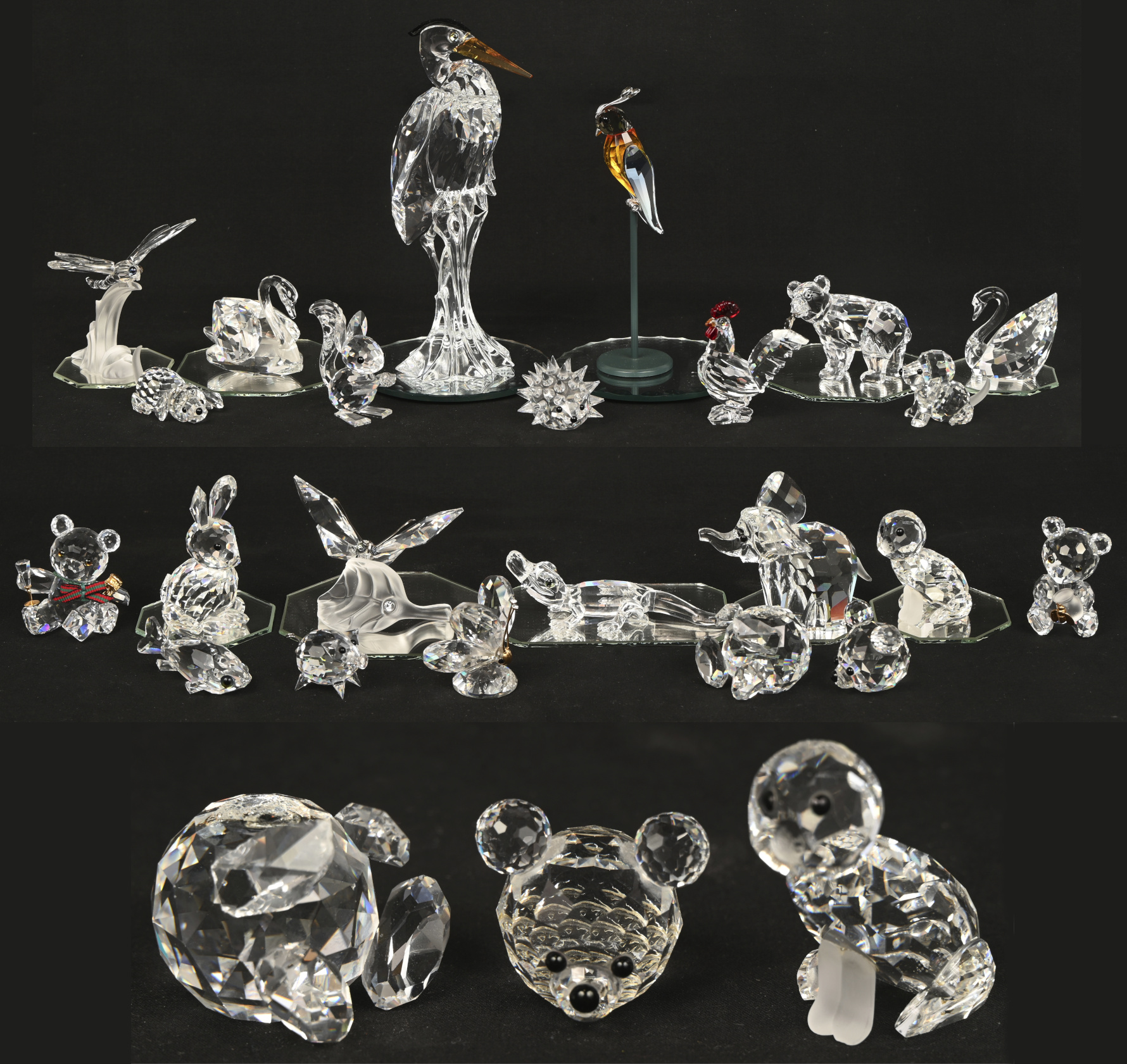 Een groot lot van kristallen Swarovski diertjes en insecten. Waaronder; beren, honden, vlinders, zwanen, een egel en een grote reiger met gekleurde delen. Toegevoegd enkele presentatiespiegeltjes en twee stukken met schade Een groot lot van kristallen Swarovski diertjes en insecten. Waaronder; beren, honden, vlinders, zwanen, een egel en een grote reiger met gekleurde delen. Toegevoegd enkele presentatiespiegeltjes en twee stukken met schade.