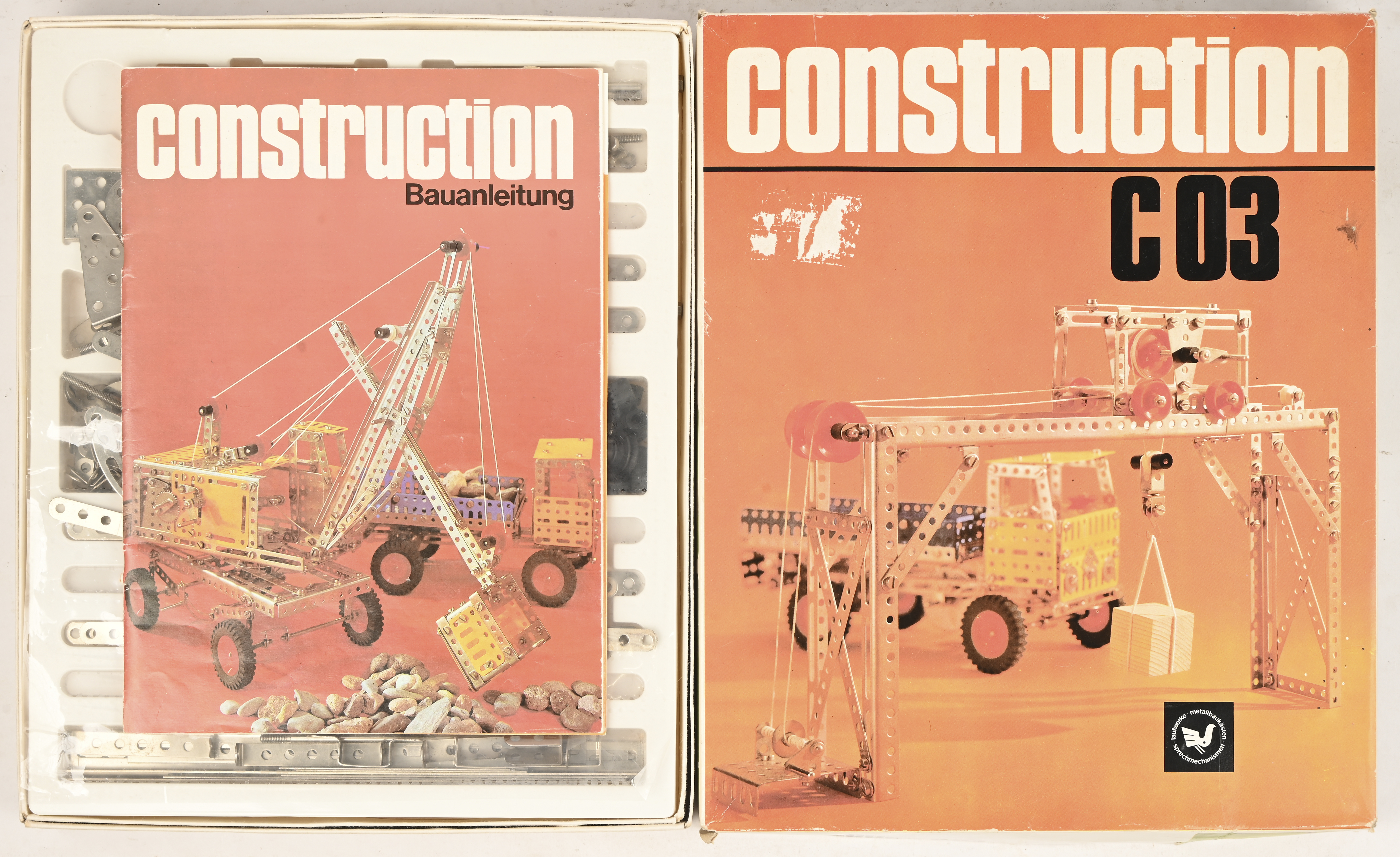 Een vintage bouwdoos: construction C03, laufwerke - metalbaukästen - sprechmechanismen. Met handleiding Een vintage bouwdoos: construction C03, laufwerke - metalbaukästen - sprechmechanismen. Met handleiding.