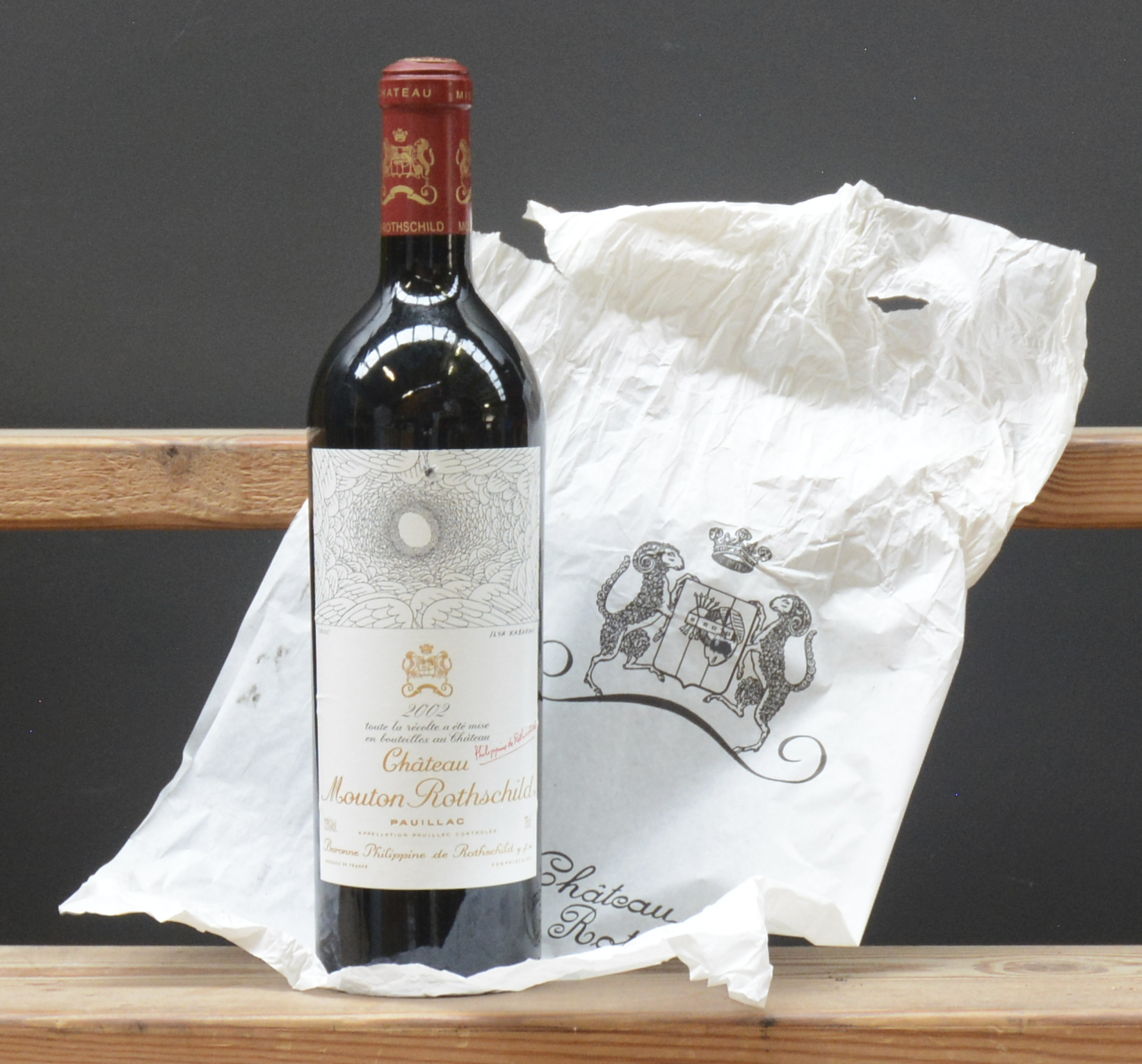 Ch. Mouton-Rothschild A.C. Pauillac 1e grand cru classé M.C Ch. Mouton-Rothschild A.C. Pauillac 1e grand cru classé M.C. 2002 aantal: 1 bt