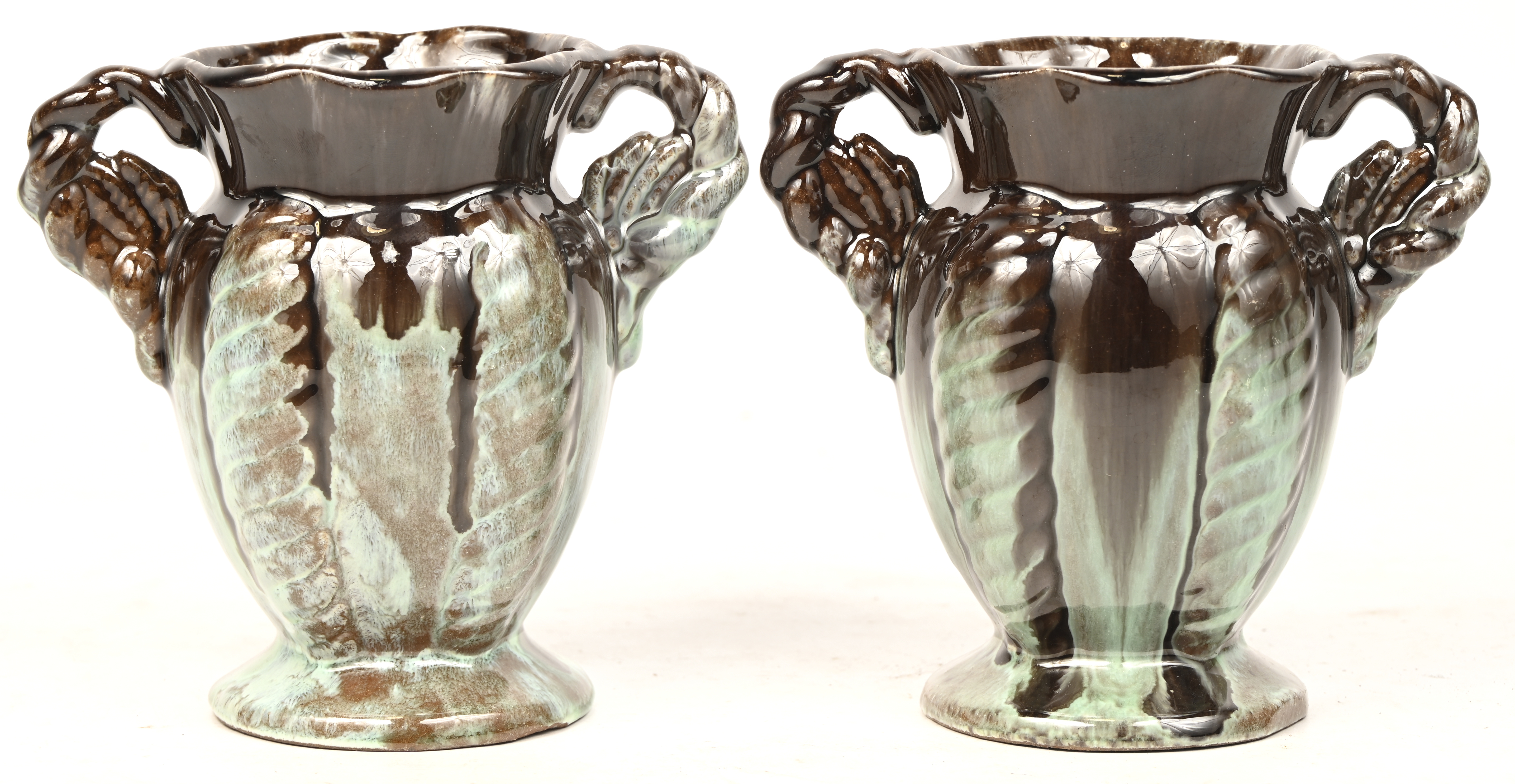 Een paar West Germany vaasjes. Gemerkt 514/14 Een paar West Germany vaasjes. Gemerkt 514/14.