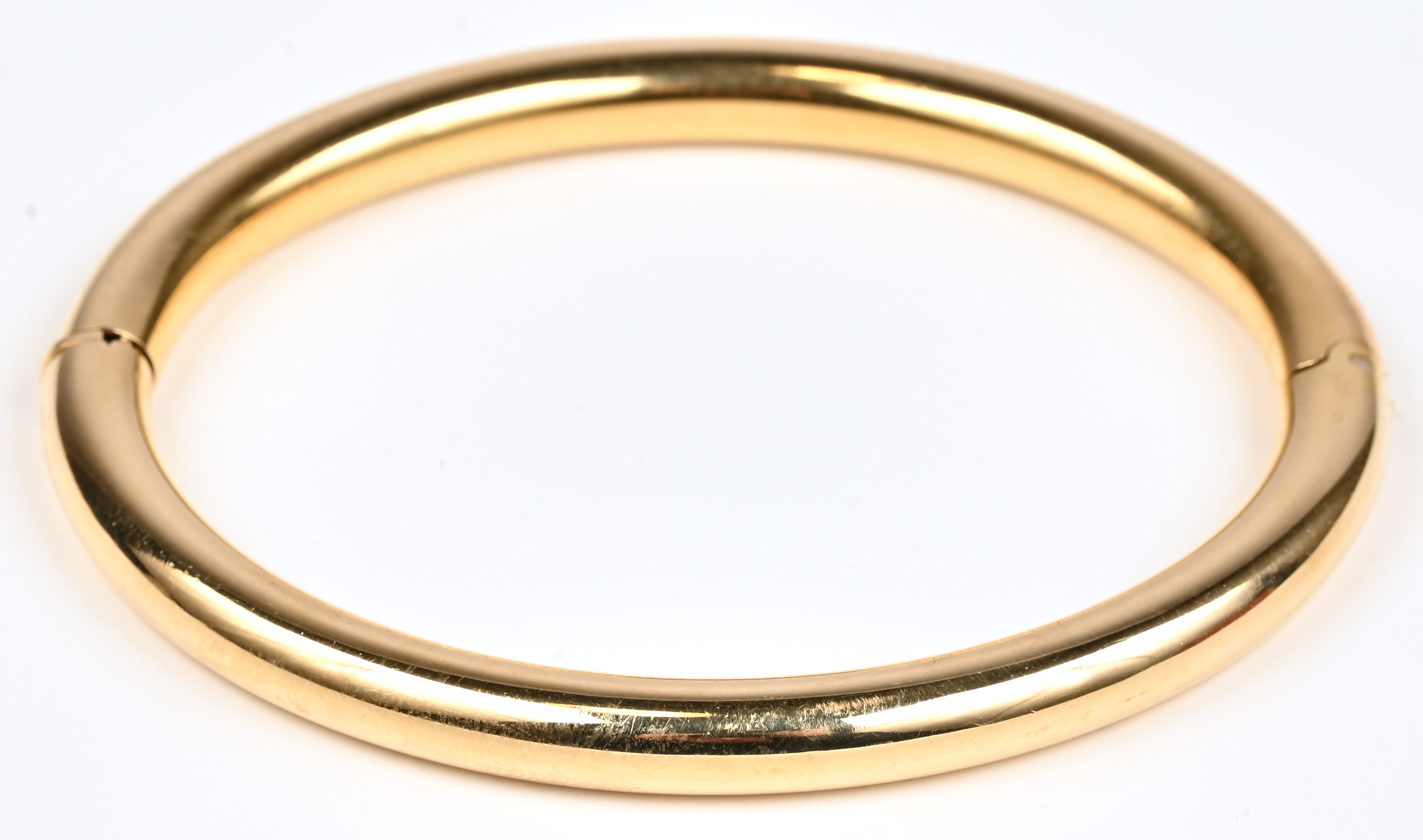 Een 18 kt geelgouden slavenarmband Een 18 kt geelgouden slavenarmband.