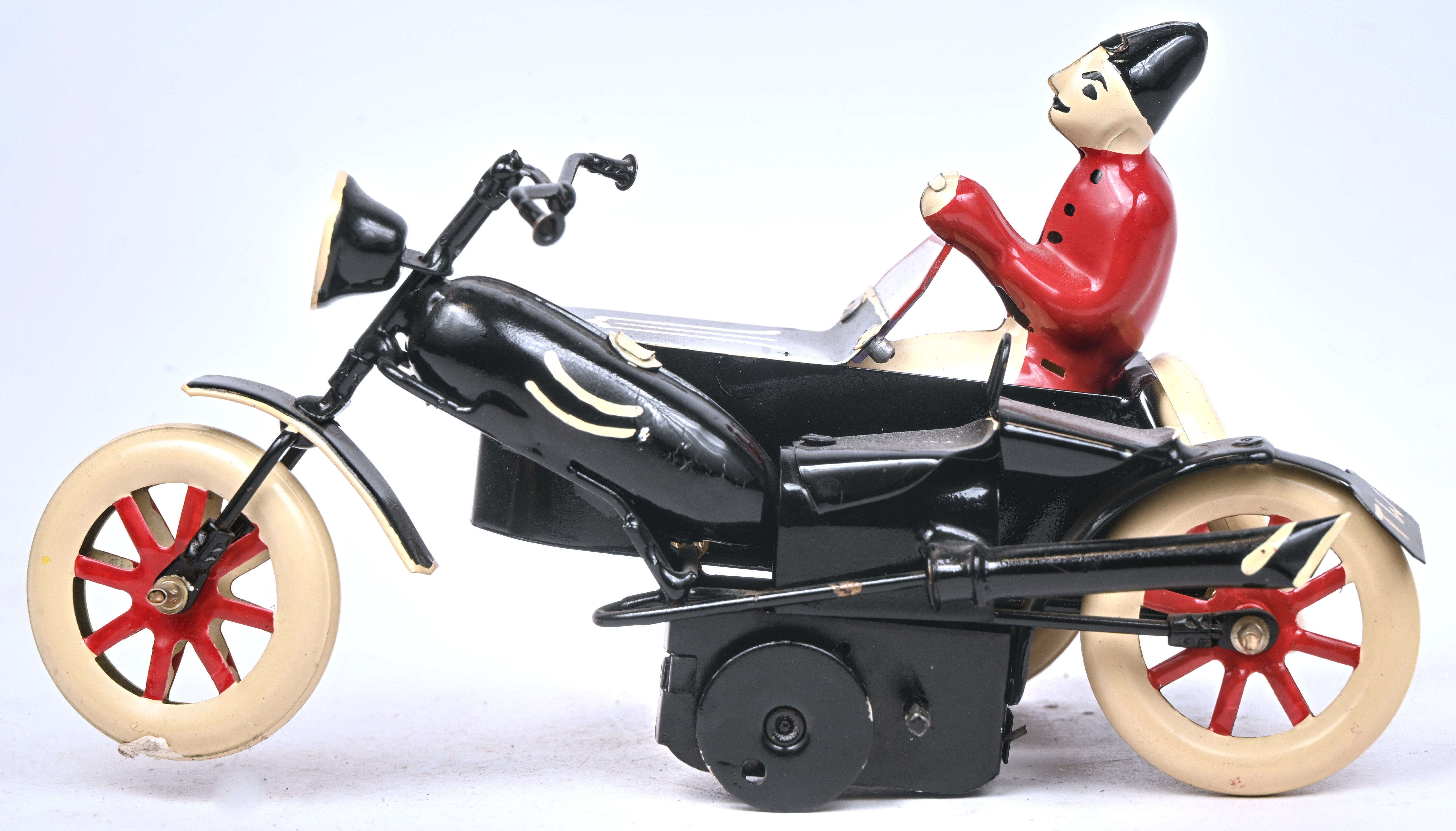 ‘Motorrad mit Beiwagen (schwarz)’, model T-186. Nr 84 uit een oplage van 250 exemplaren. Met OVP. Opwindbaar ‘Motorrad mit Beiwagen (schwarz)’, model T-186. Nr 84 uit een oplage van 250 exemplaren. Met OVP. Opwindbaar.