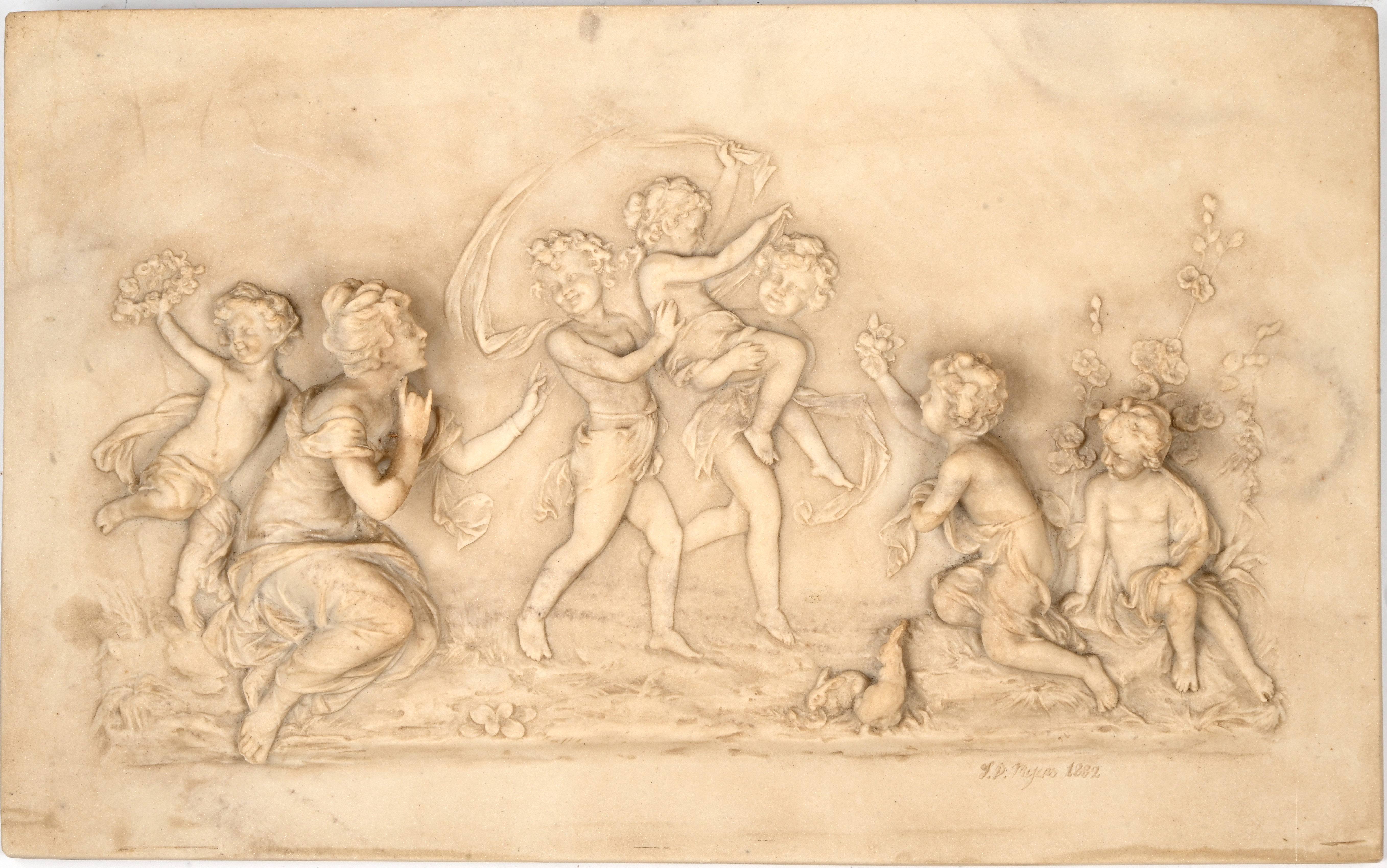 Plaquette van marmercomposiet naar een origineel uit de XIXde eeuw. Allegorie op de lente Plaquette van marmercomposiet naar een origineel uit de XIXde eeuw. Allegorie op de lente.