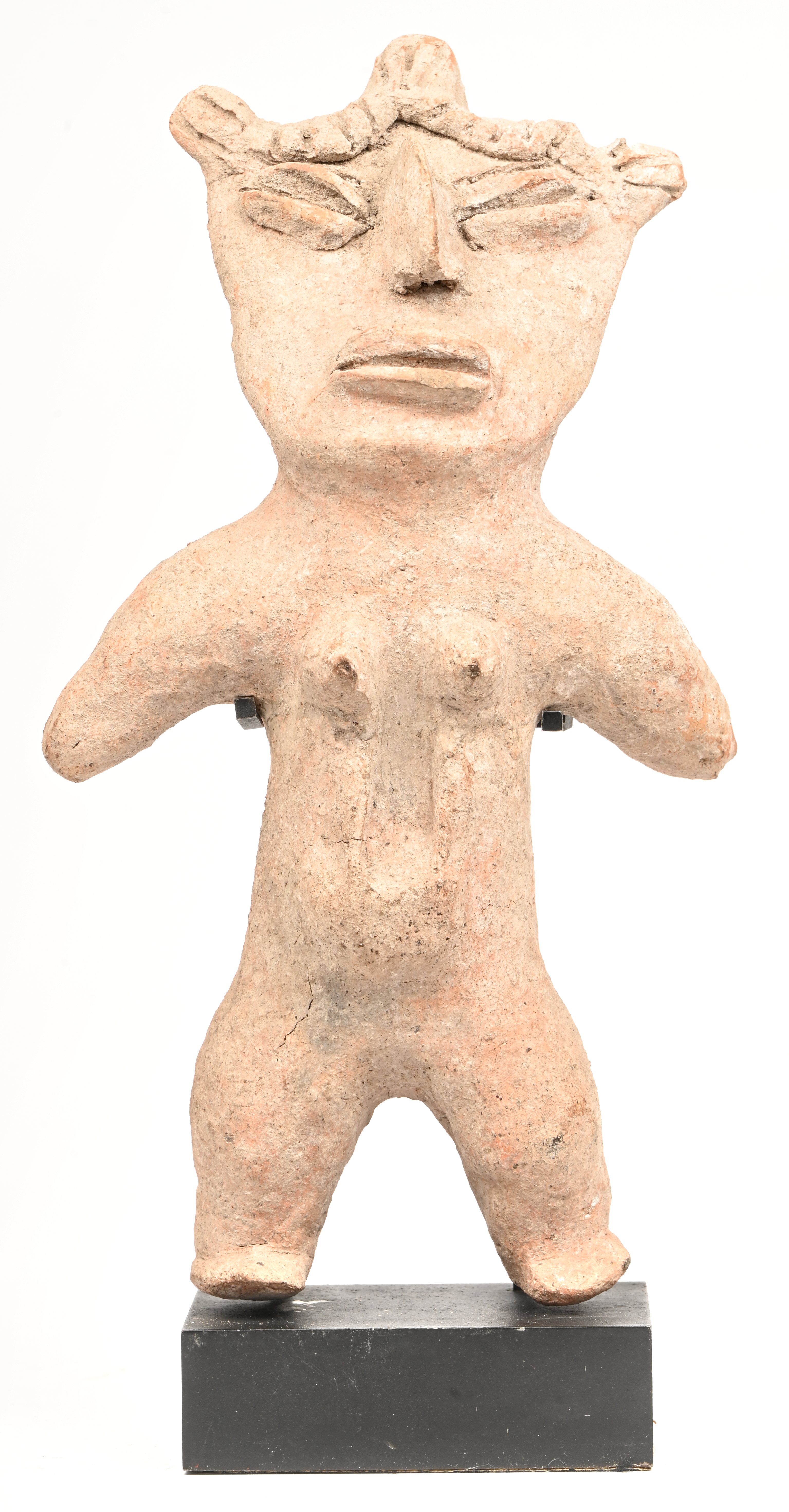 Een beeldje in terracotte toegeschreven aan de Tlatilco bevolking uit Mexico. Mogelijk pre-Colombiaans Een beeldje in terracotte toegeschreven aan de Tlatilco bevolking uit Mexico. Mogelijk pre-Colombiaans.