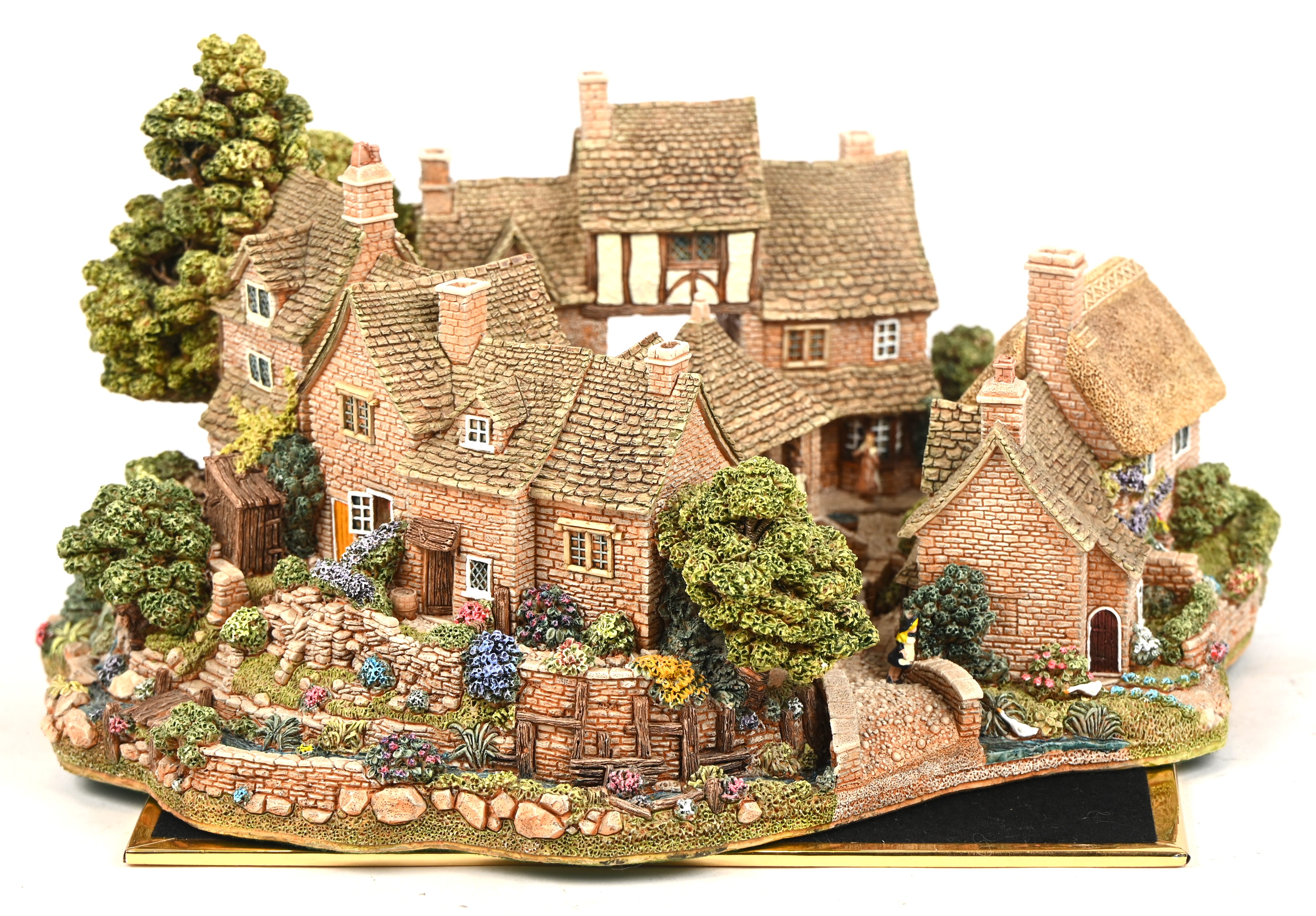Een ‘Lilliput Lane’ huisje. In OVP, met attest. ‘Chipping Coombe’ Een ‘Lilliput Lane’ huisje. In OVP, met attest. ‘Chipping Coombe’.