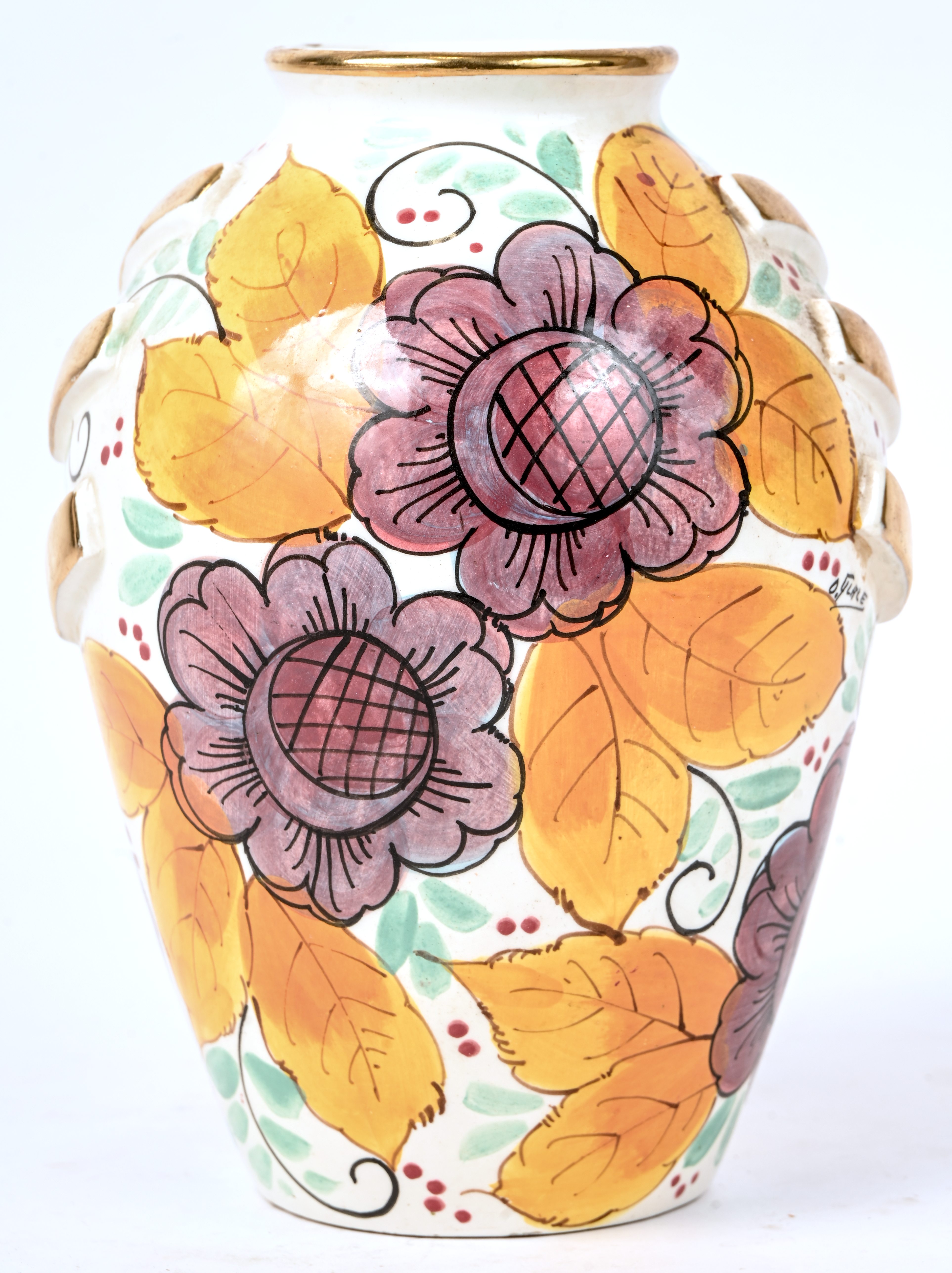 Een kleurrijke art deco vaas met bloemendecor. Gemerkt onderaan G.M.Mons en getekend D. Dolores Een kleurrijke art deco vaas met bloemendecor. Gemerkt onderaan G.M.Mons en getekend D. Dolores.