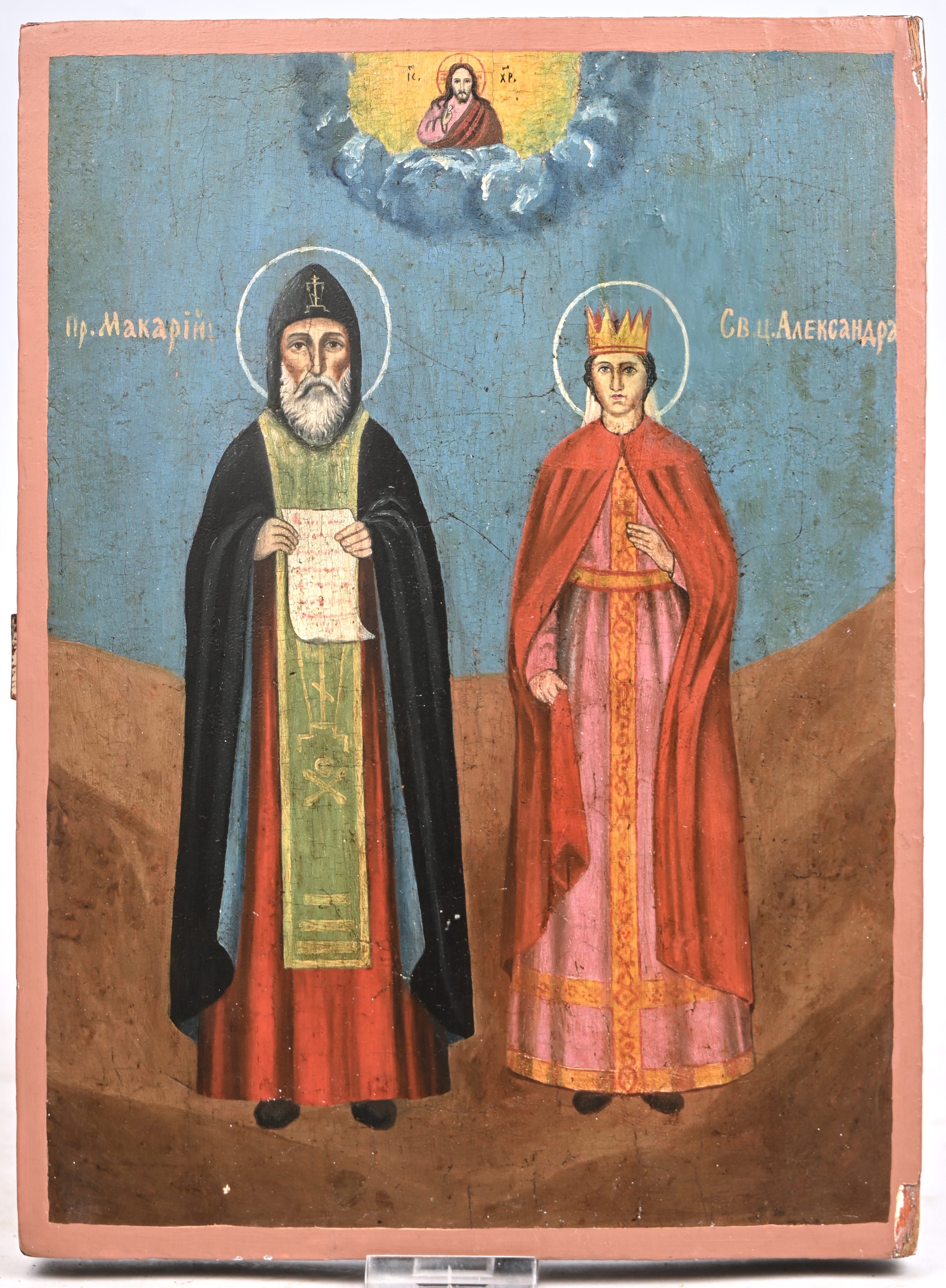 “De heiligen Makari en princes Aleksandra”. Russische icoon. Tempera op paneel, XIXde eeuw “De heiligen Makari en princes Aleksandra”. Russische icoon. Tempera op paneel, XIXde eeuw.