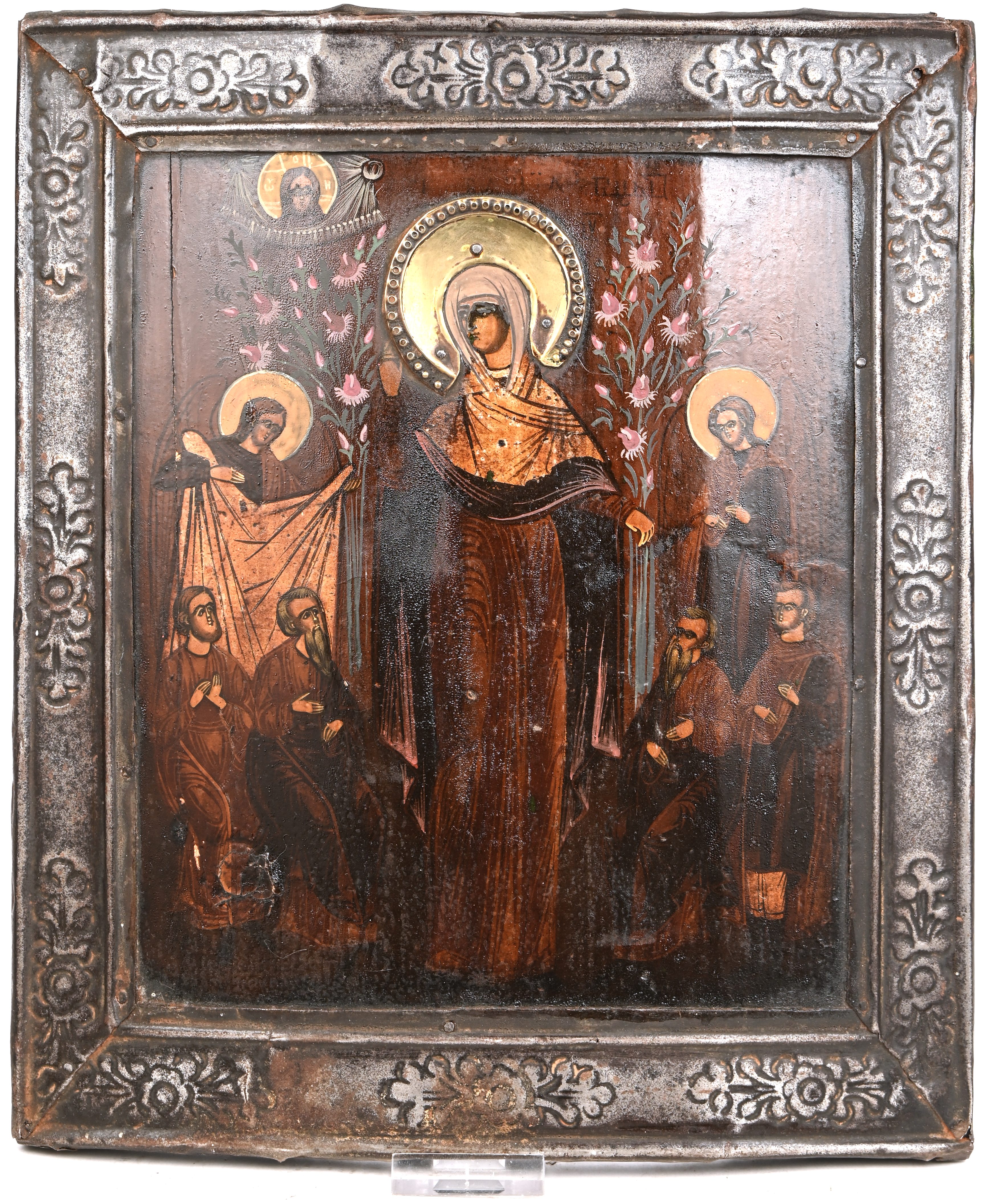 “Moeder van God, Troost van Alle Bedrukten”. Russische icoon. Tempera op paneel met metalen kader en koperen aureool, XIXde eeuw “Moeder van God, Troost van Alle Bedrukten”. Russische icoon. Tempera op paneel met metalen kader en koperen aureool, XIXde eeuw.