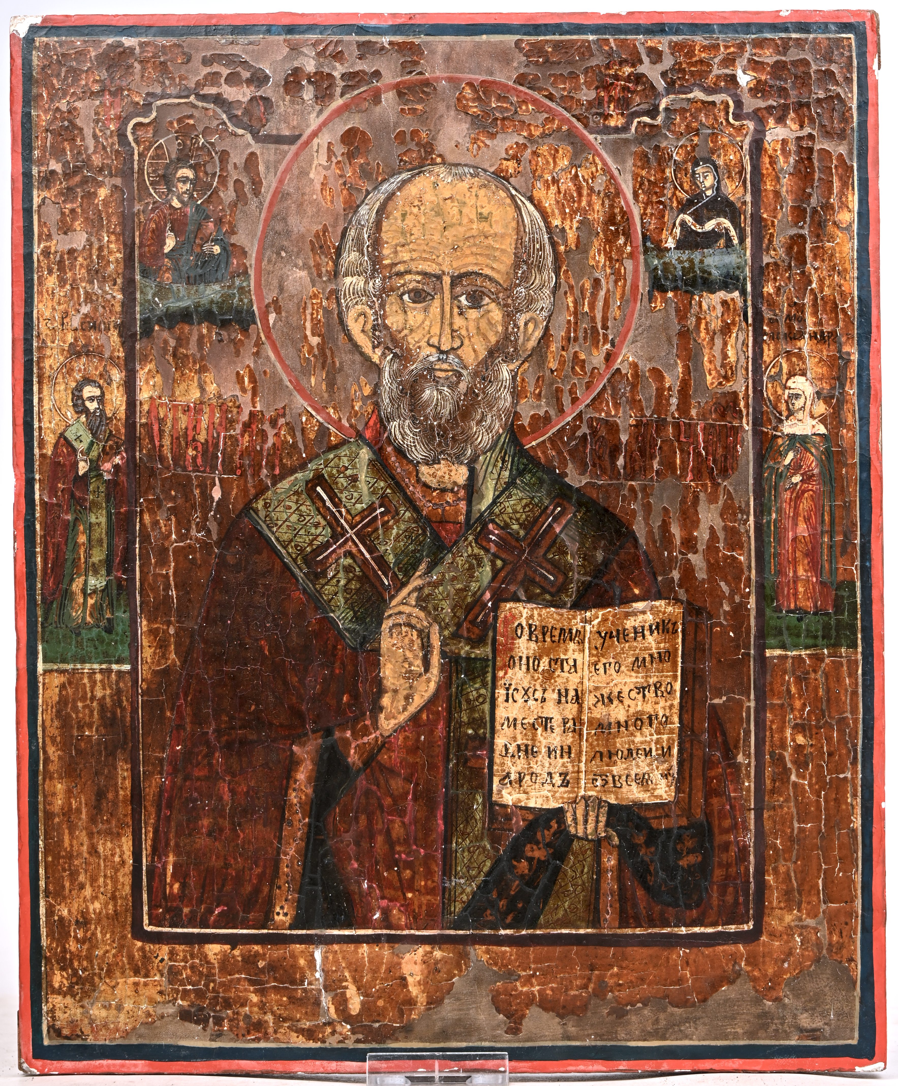 “Sint Nicolaas de wonderdoener”. Russische icoon. Tempera en zilververf op paneel, XIXde eeuw “Sint Nicolaas de wonderdoener”. Russische icoon. Tempera en zilververf op paneel, XIXde eeuw.