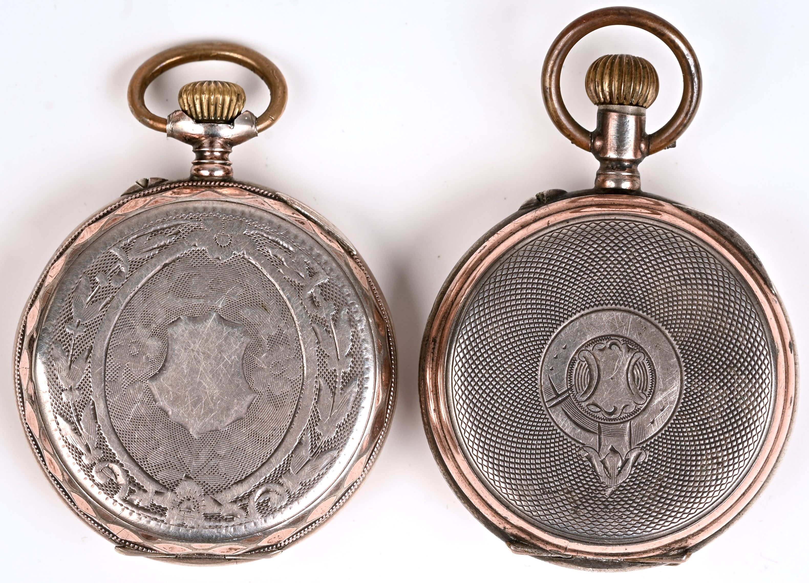 Twee zilveren zakhorloges, 800‰. Waarvan één topje te herstellen Twee zilveren zakhorloges, 800‰. Waarvan één topje te herstellen.
