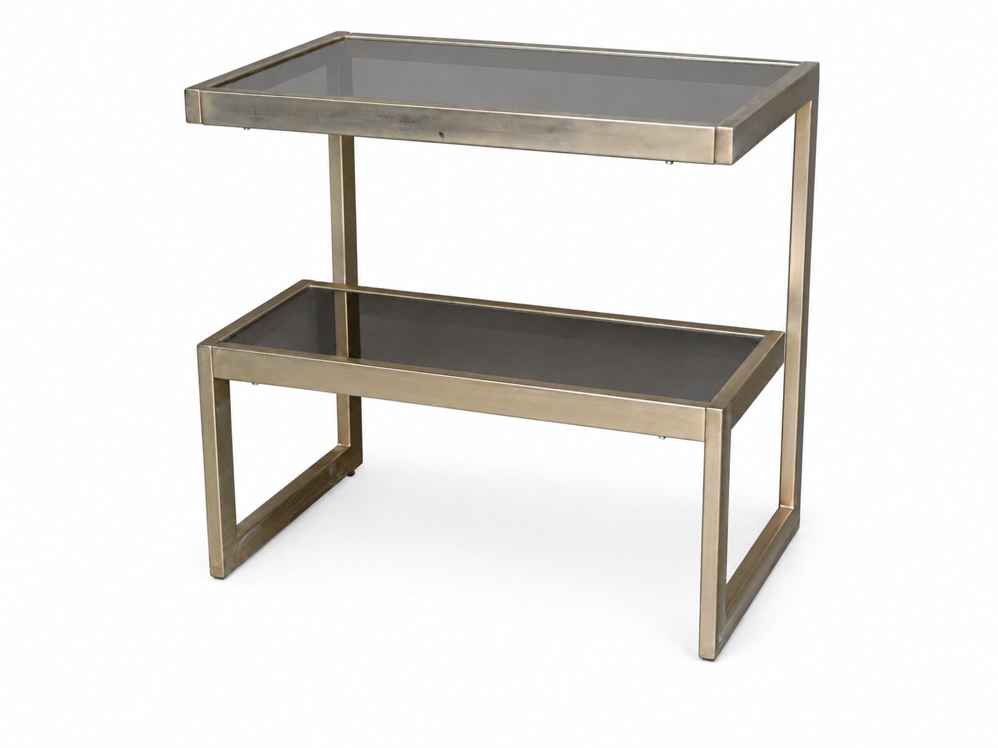 ‘G-tafel’. Een vintage bijzetmeubel van 23kt verguld metaal, met fumee glas en spiegelblad ‘G-tafel’. Een vintage bijzetmeubel van 23kt verguld metaal, met fumee glas en spiegelblad.