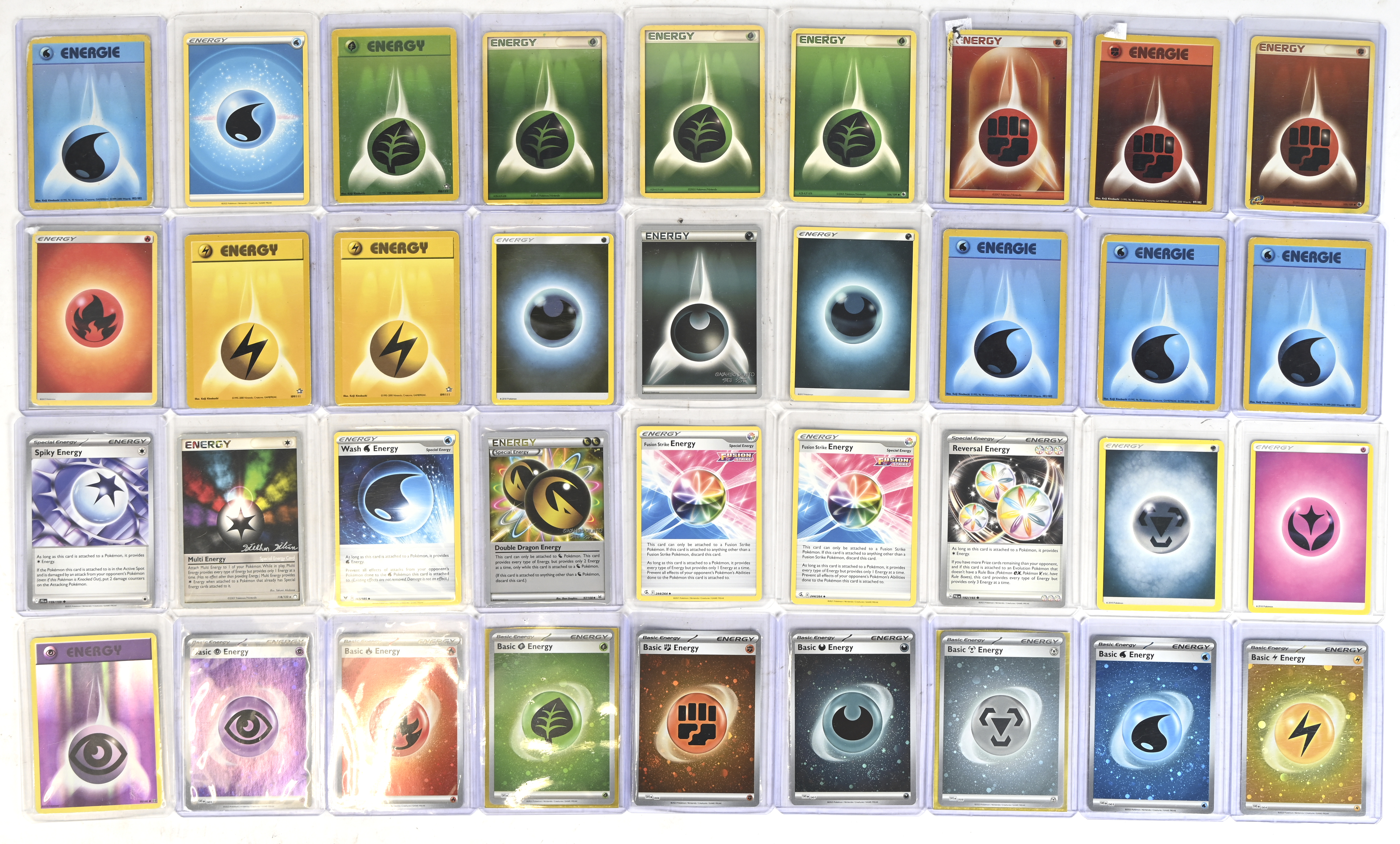 Een lot Energy cards: 9 Holofoil (waaronder Psychic Energy - XY - Evolutions (EVO) Holofoil). 2x Fusion Strike Energy, Double Dragon Energy, Wash (water) Energy, Multi Energy, Spiky Energy & Reversal Energy. +20 varia energy cards Een lot Energy cards: 9 Holofoil (waaronder Psychic Energy - XY - Evolutions (EVO) Holofoil). 2x Fusion Strike Energy, Double Dragon Energy, Wash (water) Energy, Multi Energy, Spiky Energy & Reversal Energy. +20 varia energy cards.