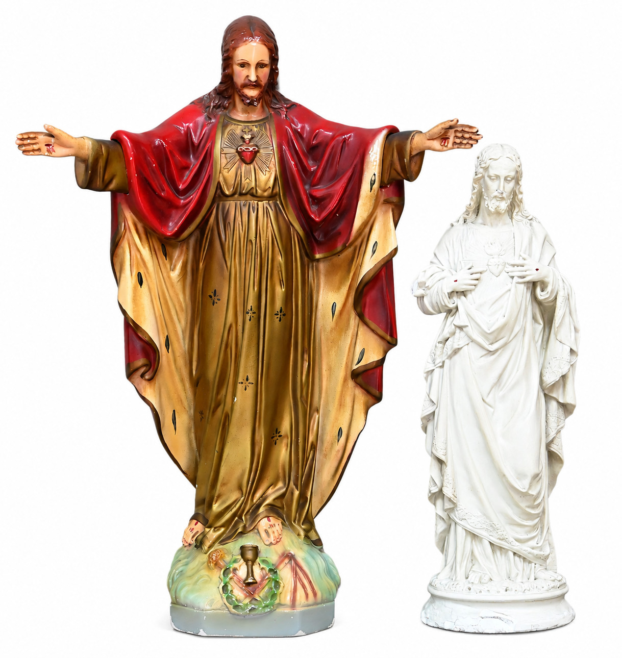 Twee plaasteren Christus beelden. Belde met stukjes manco en herstellingen Twee plaasteren Christus beelden. Belde met stukjes manco en herstellingen.