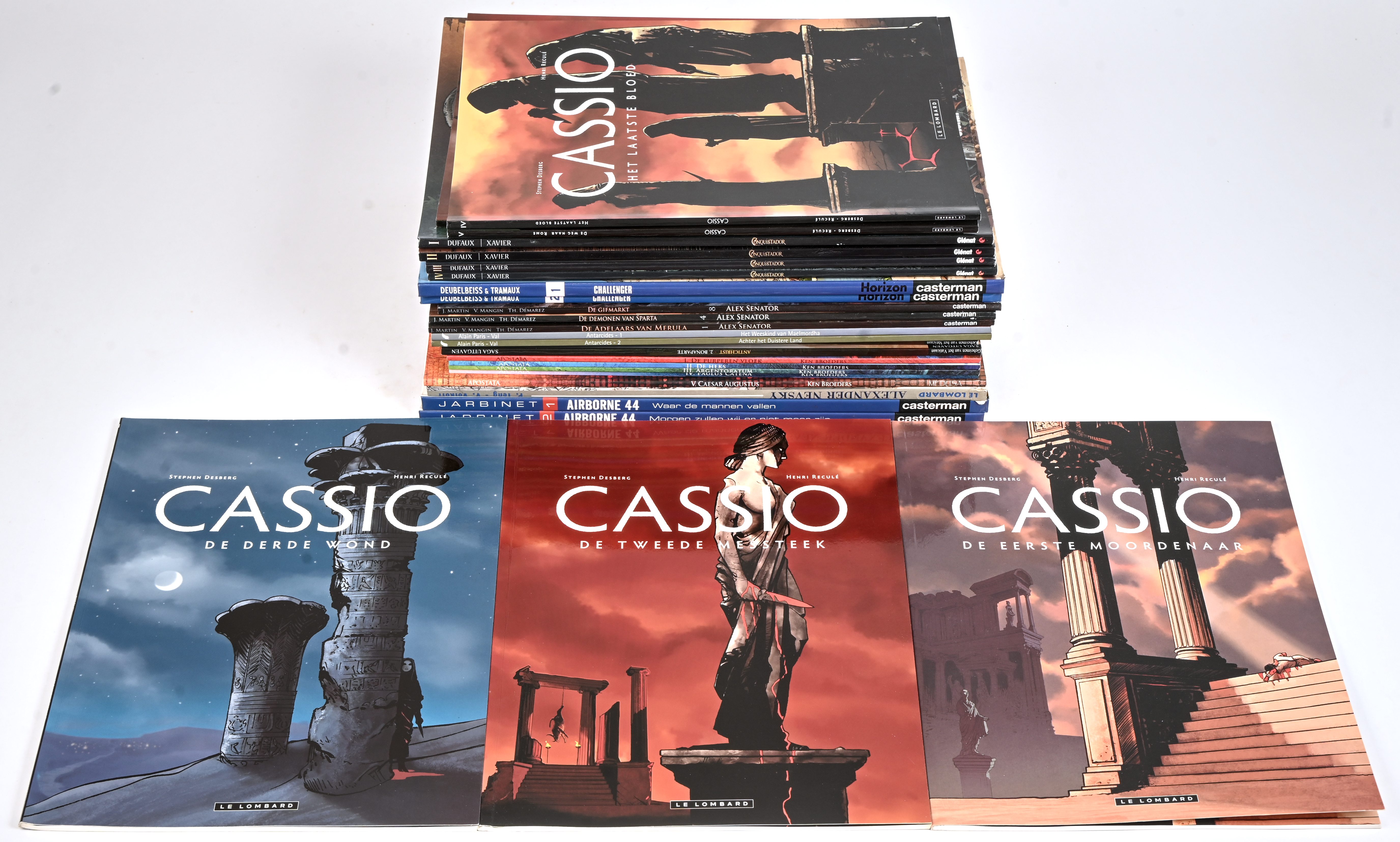 Een partij stripalbums met titels uit de reeksen: ‘Airborne 44’ (2), ‘Alexander Nevsky’ (1), ‘Apostata’ (5), ‘Antichrist’ (2), ‘Antarcides’ (2), ‘Alex Senator’ (3), ‘Challenger’ (2), ‘Conquistador’ (4) en ‘Cassio’ (6). Mogelijk met geschreven markeringen op de kaft Een partij stripalbums met titels uit de reeksen: ‘Airborne 44’ (2), ‘Alexander Nevsky’ (1), ‘Apostata’ (5), ‘Antichrist’ (2), ‘Antarcides’ (2), ‘Alex Senator’ (3), ‘Challenger’ (2), ‘Conquistador’ (4) en ‘Cassio’ (6). Mogelijk met geschreven markeringen op de kaft.