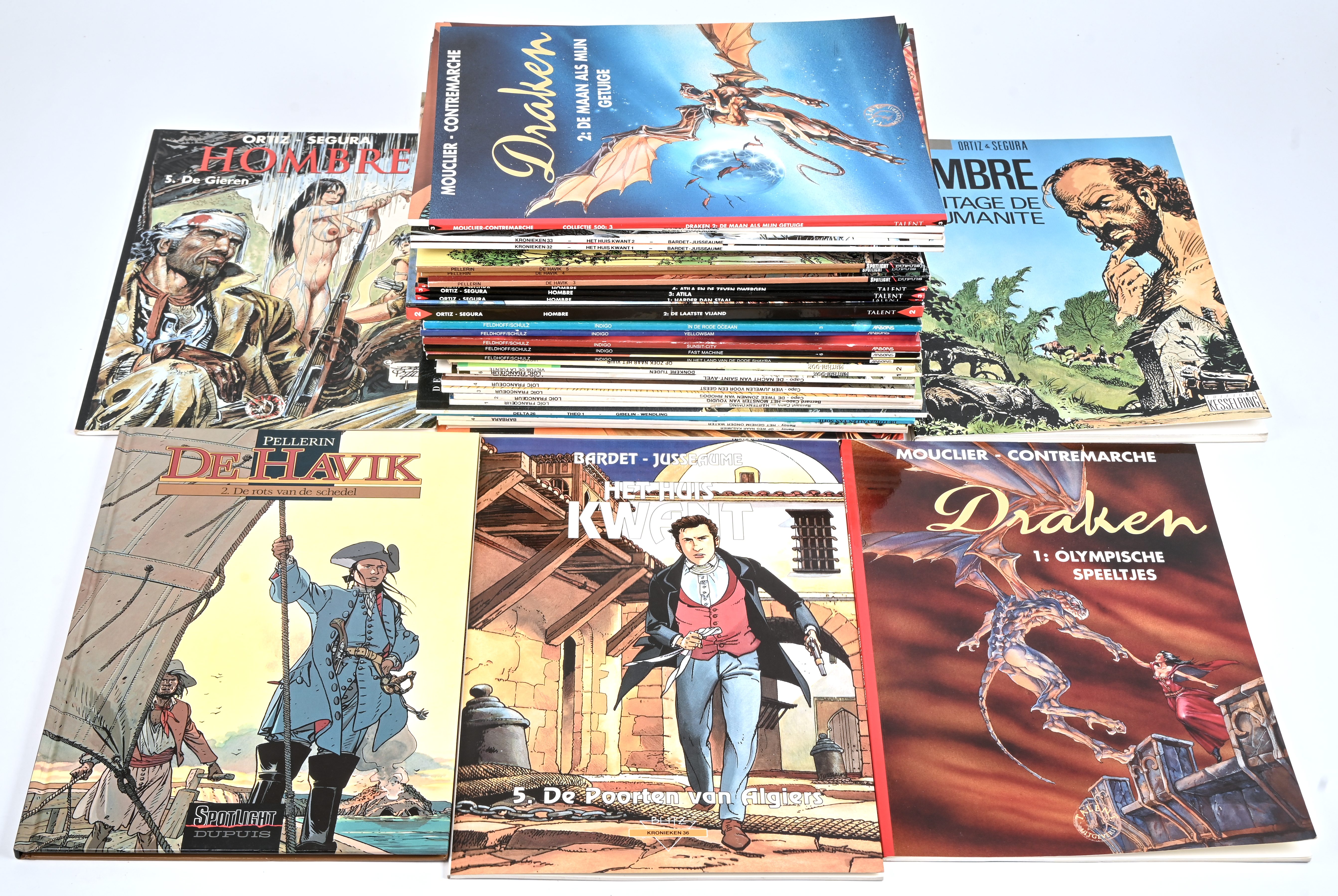 Een partij stripalbums met titels uit de reeksen: ‘Barbara’ (4), ‘De Lotgevallen van Sofie’ (1), ‘Theo’ (1), ‘Loïc Francceur’ (6), ‘Mathai-Dor’ (2), ‘Indigo’ (6), ‘Hombre’ (6 waarvan 1 hardcover en één Franstalig), ‘De Havik’ (5 waarvan 2 harcover), ‘Het Huis Kwant’ (5) en ‘Draken’ (2). Mogelijk met geschreven markeringen op de kaft Een partij stripalbums met titels uit de reeksen: ‘Barbara’ (4), ‘De Lotgevallen van Sofie’ (1), ‘Theo’ (1), ‘Loïc Francceur’ (6), ‘Mathai-Dor’ (2), ‘Indigo’ (6), ‘Hombre’ (6 waarvan 1 hardcover en één Franstalig), ‘De Havik’ (5 waarvan 2 harcover), ‘Het Huis Kwant’ (5) en ‘Draken’ (2). Mogelijk met geschreven markeringen op de kaft.