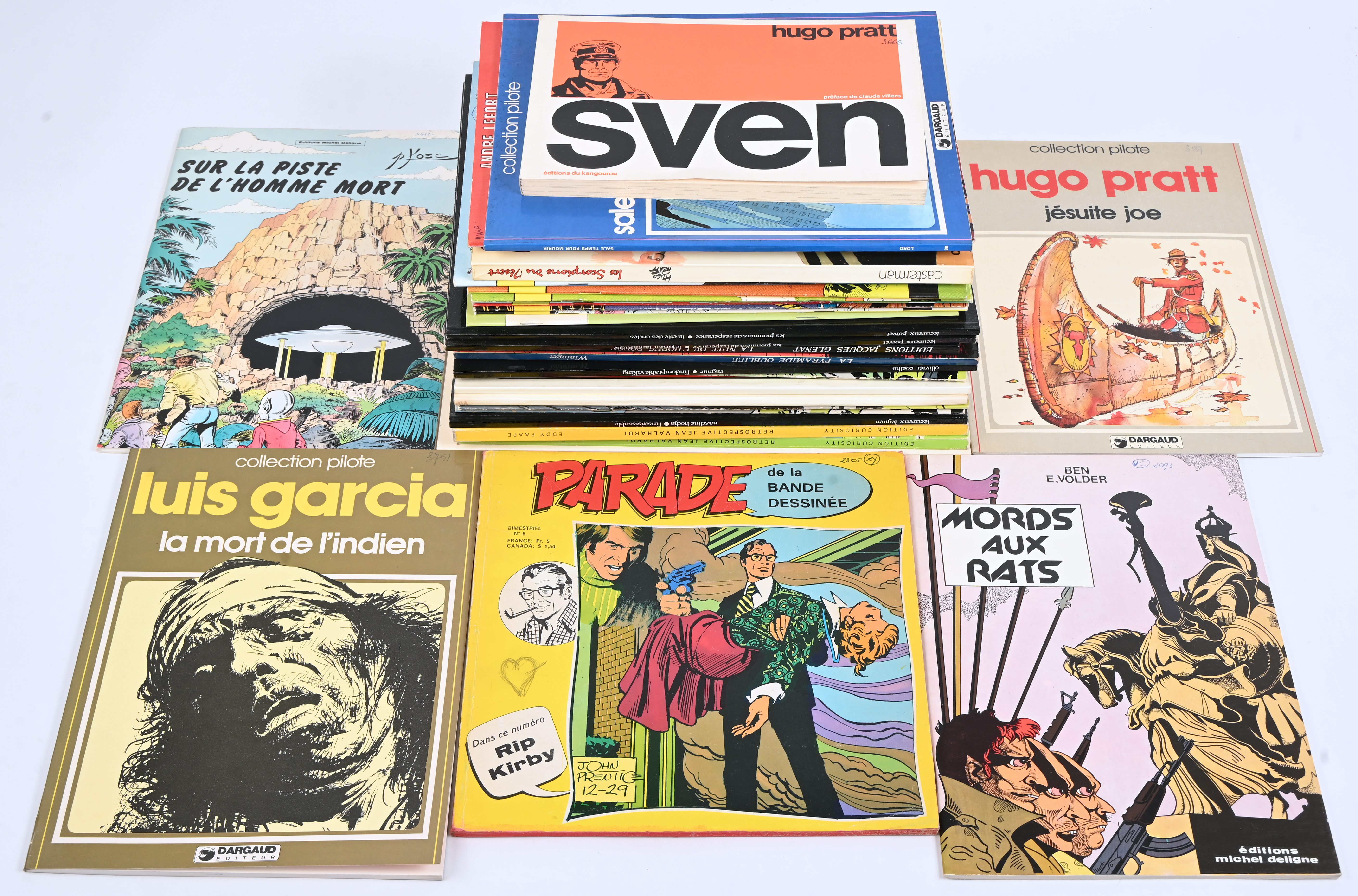 Een partij Franstalige stripalbums met titels uit de reeksen: ‘Mords aux Rats’ (1), ‘Milady 3000’ (1), ‘Rip Kirby’ (1), ‘Tiger Joe’ (3), ‘Jean Valhardi’ (2), ‘Nasdine Hodja’ (1), ‘Jésuite Joe’ (1), ‘Thorkaël’ (2), ‘Udolfo’ (1), ‘Marc Dacier’ (7), ‘Mike Cougar’ (1), ‘Ragnar’ (1), ‘Metal Hurlant’ (1, ‘Wininger’ (2 waarvan 1 hardcover), ‘Les Pionniers de l’Esperance’ (2), ‘Les Scorpions de Désert’ (1), Sabre’ (1), ‘Sven’ (1), ‘Andre Lefort’ (1), ‘Luis Garcia’ (1) en ‘Loro’ (1). Mogelijk met geschreven markeringen op de kaft Een partij Franstalige stripalbums met titels uit de reeksen: ‘Mords aux Rats’ (1), ‘Milady 3000’ (1), ‘Rip Kirby’ (1), ‘Tiger Joe’ (3), ‘Jean Valhardi’ (2), ‘Nasdine Hodja’ (1), ‘Jésuite Joe’ (1), ‘Thorkaël’ (2), ‘Udolfo’ (1), ‘Marc Dacier’ (7), ‘Mike Cougar’ (1), ‘Ragnar’ (1), ‘Metal Hurlant’ (1, ‘Wininger’ (2 waarvan 1 hardcover), ‘Les Pionniers de l’Esperance’ (2), ‘Les Scorpions de Désert’ (1), Sabre’ (1), ‘Sven’ (1), ‘Andre Lefort’ (1), ‘Luis Garcia’ (1) en ‘Loro’ (1). Mogelijk met geschreven markeringen op de kaft.