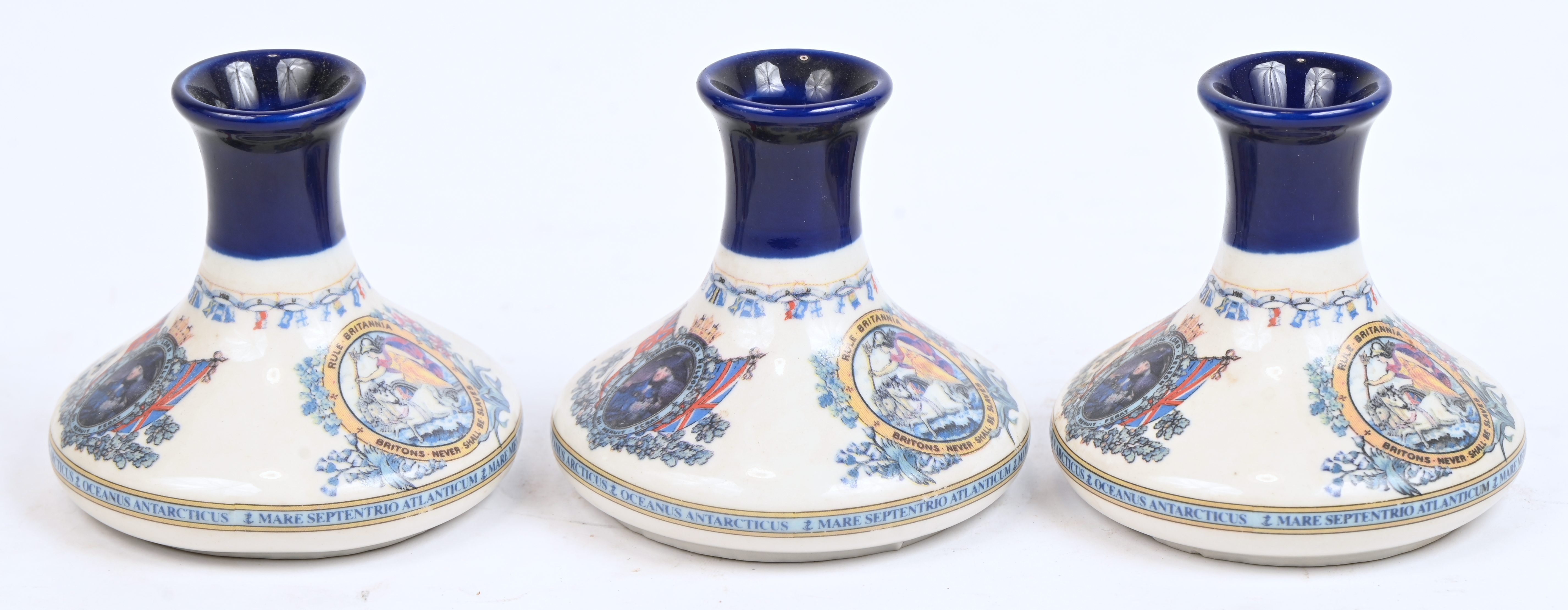 Drie porseleinen kruikjes van ‘British Navy Pusser’s Rum’ Drie porseleinen kruikjes van ‘British Navy Pusser’s Rum’.
