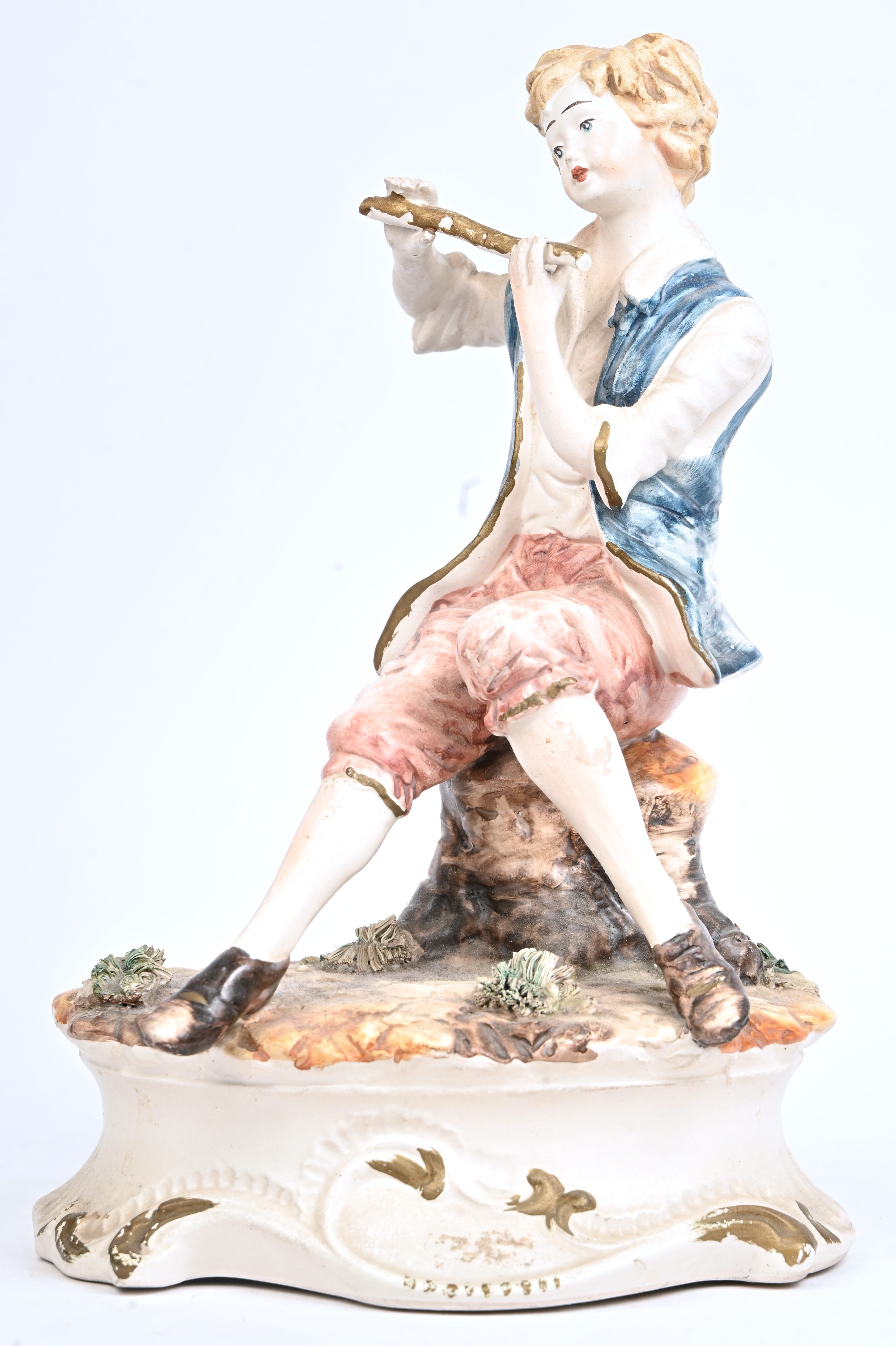 “De fluitspeler”. Een beeld van aardewerk. Gemerkt “De fluitspeler”. Een beeld van aardewerk. Gemerkt.