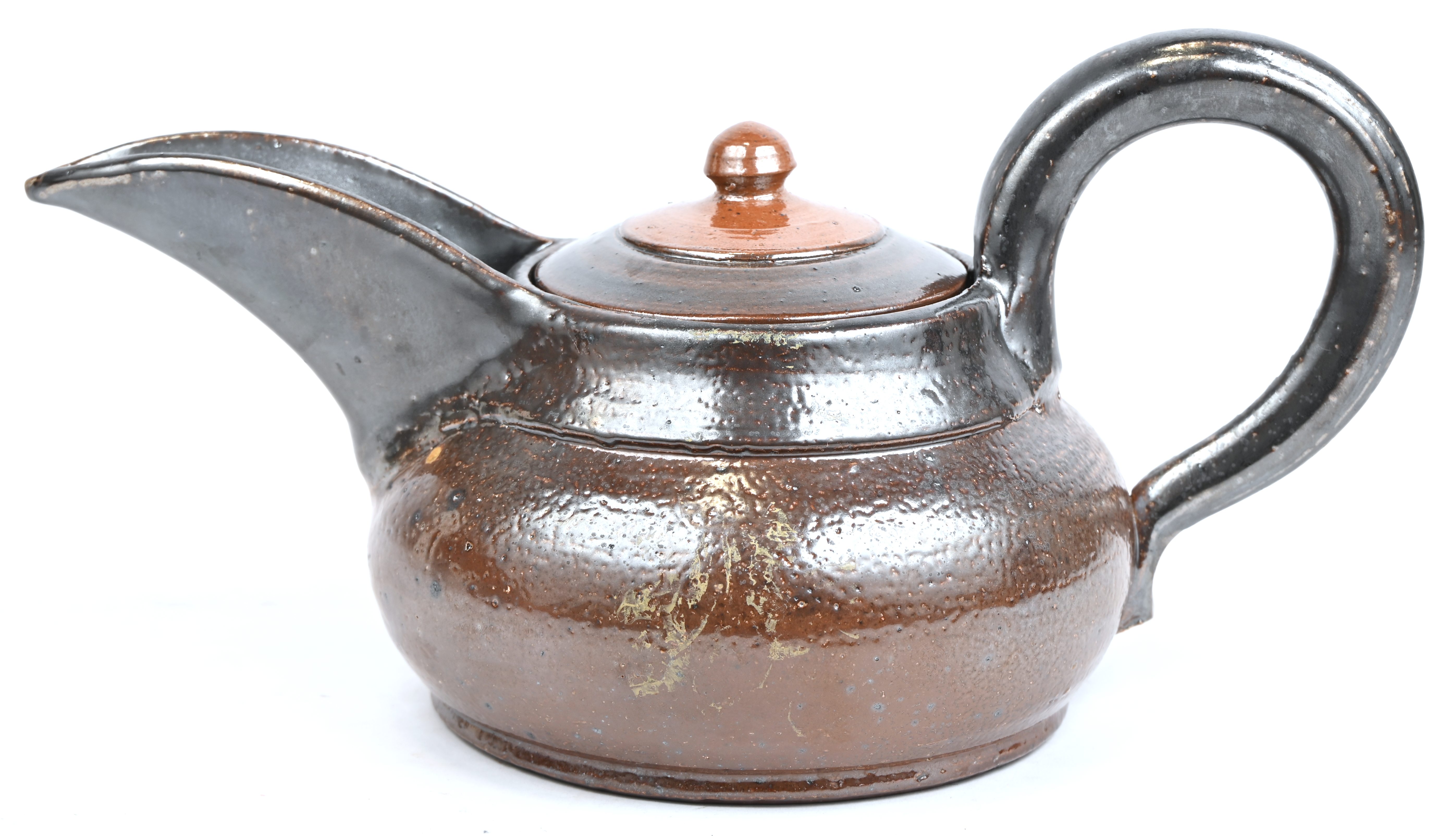 Een bruin ceramische chocoladekan, circa 1940. Naar een design van Vally Wieselthier Een bruin ceramische chocoladekan, circa 1940. Naar een design van Vally Wieselthier.